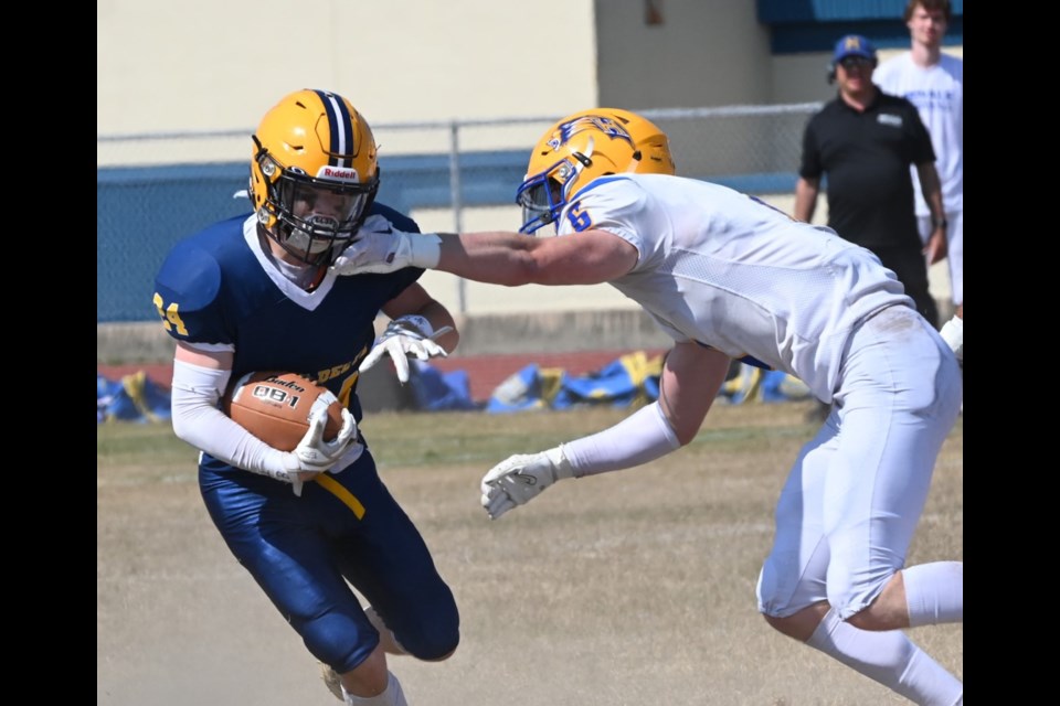South Delta running back Cameron Trolland heads up field during his team's 38-8 season opening win over the visiting Handsworth Royals on Friday in Tsawwassen. 