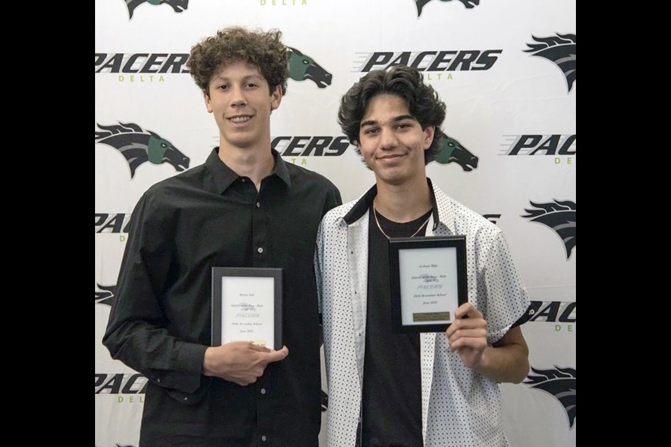A force on the volleyball and basketball court earned Simon Tate (left) Delta Secondary's Junior Male Athlete of the Year Award. 