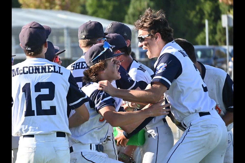 Delta Tigers celebrate their BCPBL Bantam Prep championship after a 3-1 win over the White Rock Tritons on Sunday afternoon at South Surrey Athletic Park. 