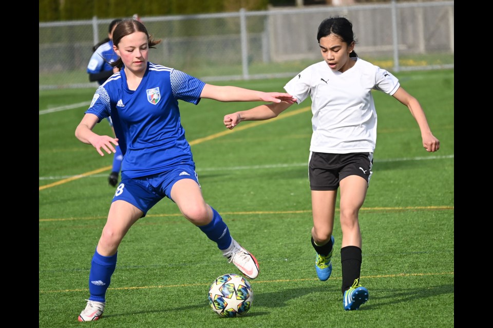 Lauryn Yee (left) scored the game's only goal as U13 Delta Coastal Selects edged Newe West 1-0 on Sunday at Holly Park in Ladner to earn a berth in this summer's Provincial "A" Cup Championships. 