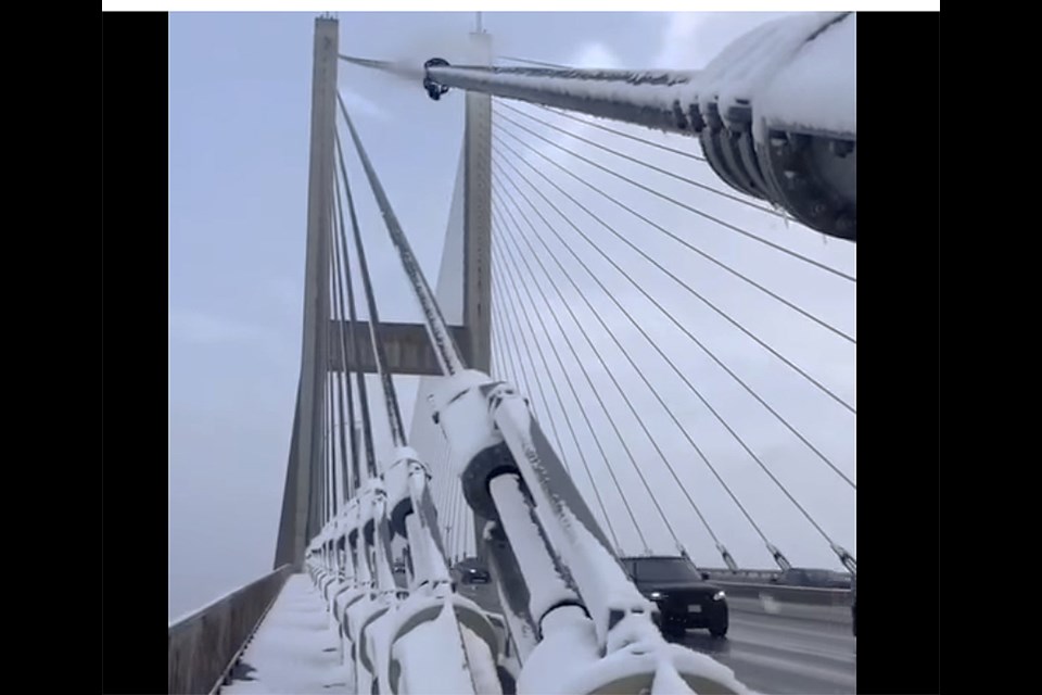 The ministry explains that during a winter event, Rope Access Technicians (affectionately known as RATS) release collars from the top of the cables. It’s done manually by rope access on the Alex Fraser Bridge, or remotely, as is the case with the Port Mann Bridge. The collars, which are basically chains that fit around the bridge cables, remove snow and ice as they move down the length of the cables.
