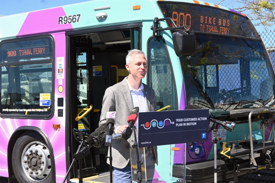 Translink CEO Kevin Quinn addresses the media outside the new Bike Bus at the Tsawwassen Ferry Terminal on Friday (June 24). 
