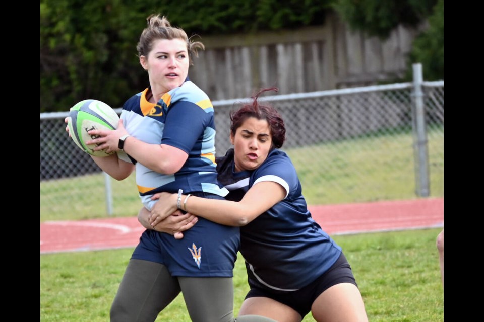 South Delta's Sam Adams in action earlier this season against the Panorama Thunder as the Tsawwassen school has re-launched a girls rugby sevens program. 
Mark Booth Photo