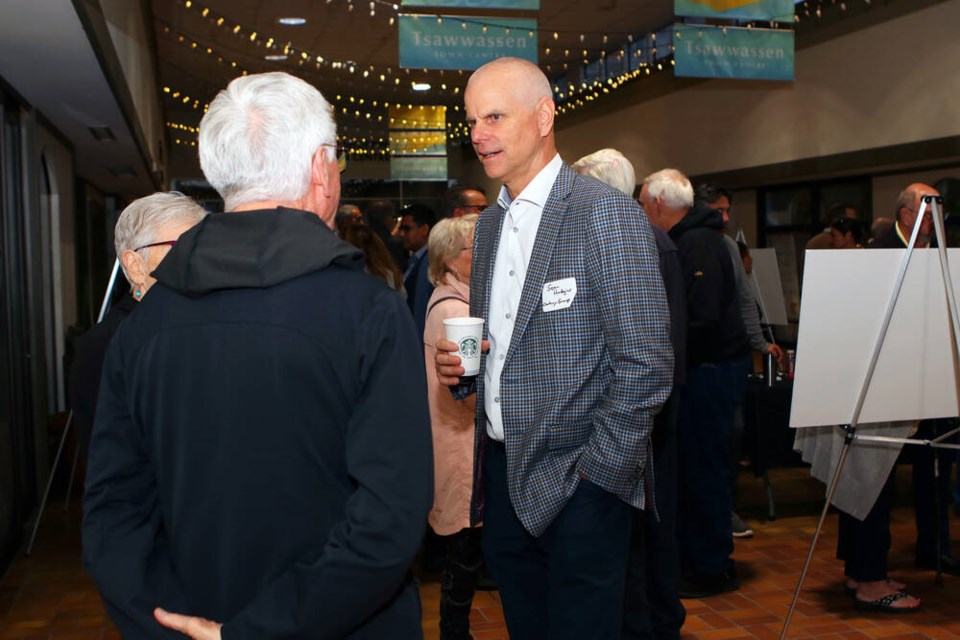 Century Group president Sean Hodgins speaks with residents at an open house to discuss plans for the redevelopment of the Tsawwassen Town Centre Mall. Jim Kinnear Photo 