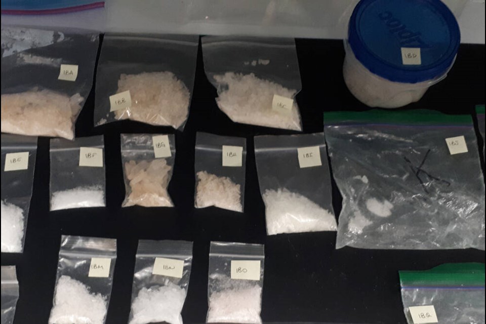 Five men from Delta, Surrey and Abbotsford have been charged following a year-long drugs and weapons investigation in Ladner by Delta Police. Photos courtesy Delta Police 