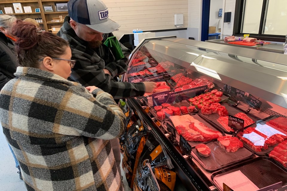Ewelina and Sebastien Gionet checked out the meat selection looking to fill their freezer.
