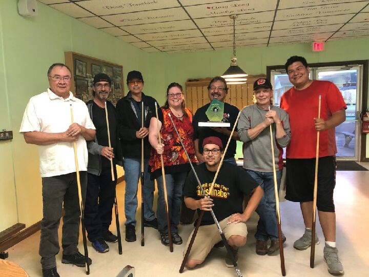 The Diamond Cutters took first place in Elliot Lake’s 8 Ball league playoffs. Team members are, from left, Bill Owl, Yves Berube, Murphy Ricard, Jacqueline Berube, Morris (Bud} Simpson, Brenden Beggs, Zane Aguonia, and, in front, Lee Simpson-Johnston.  (photo submitted)