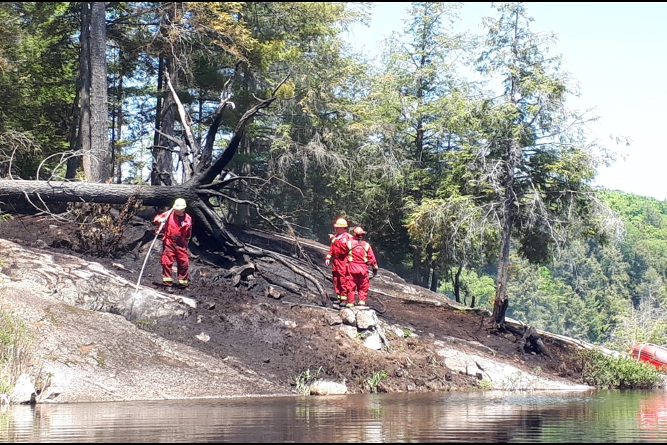 Fire crews responded to a bush fire at Angel Lake on May 29, 2023