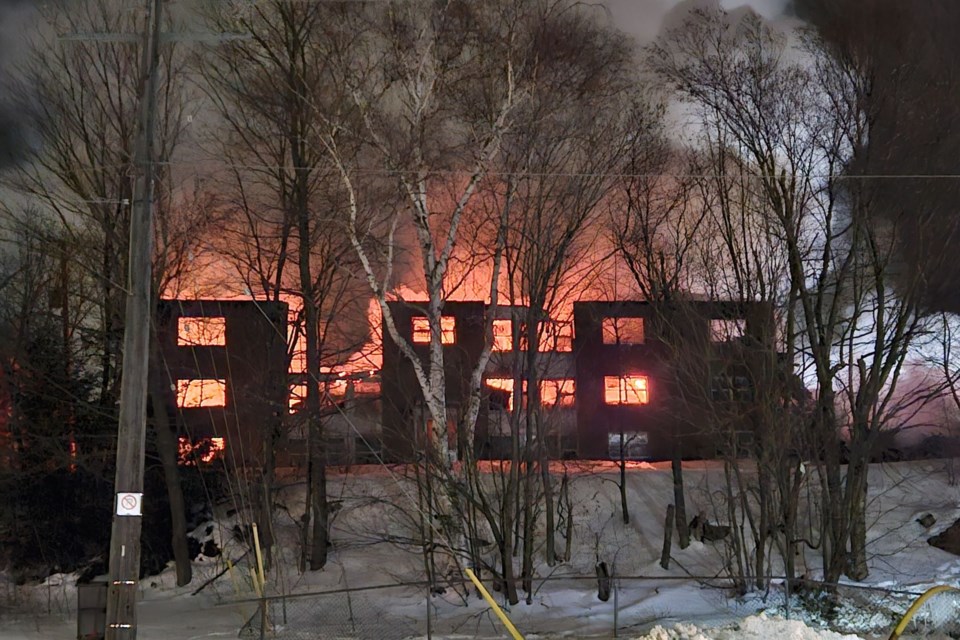 Fire consumed an apartment building on Hirshhorn Avenue overnight Thursday.