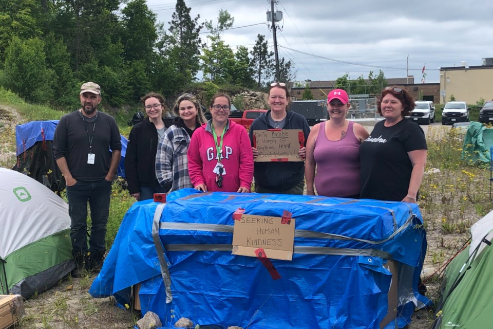 Elliot Lake Mayor pictured with shelter staff that are participating in challenge.

Left to right - Mayor Dan Marchisella, Allyson Gibson, Abby Stencill, Lynn Thompson, Kim Abercrombie, Kelly Ann Pettefer and Theresa Huiser.