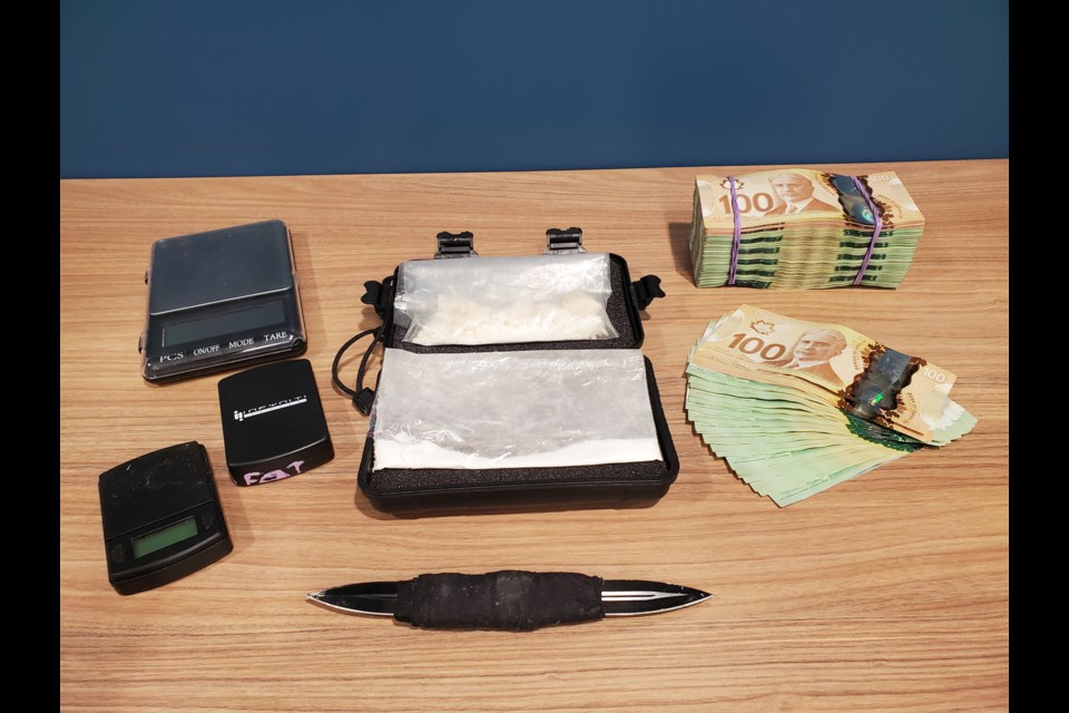 Police seized suspected fentanyl and cocaine, edged weapons and Canadian currency during an August 2022 search of a residence on Aundeck Omni Kaning First Nation.