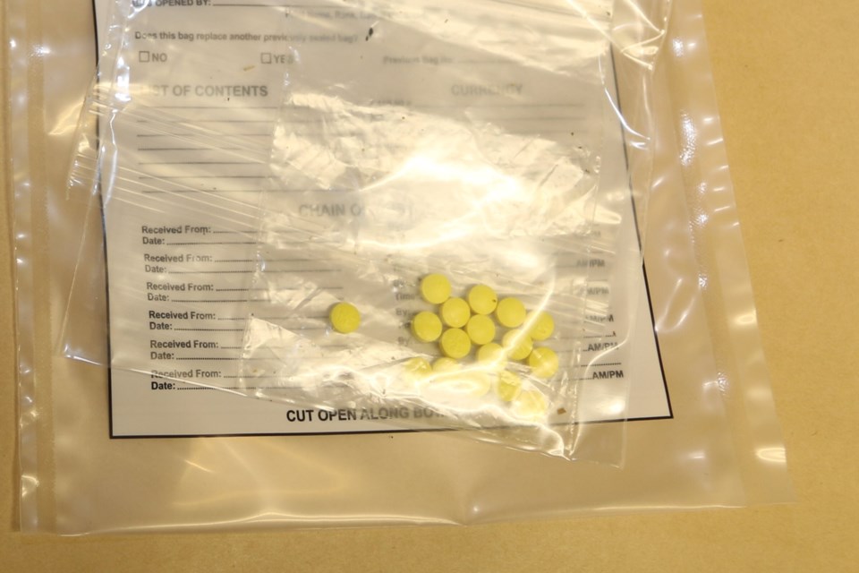 Police seized drugs after arresting person in connection with a suspicious person report in early-March.