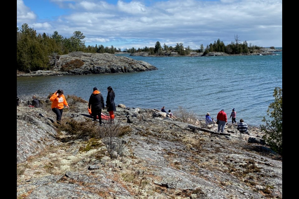 Several hikers enjoying the view at the Thessalon Coastal Trail grand opening