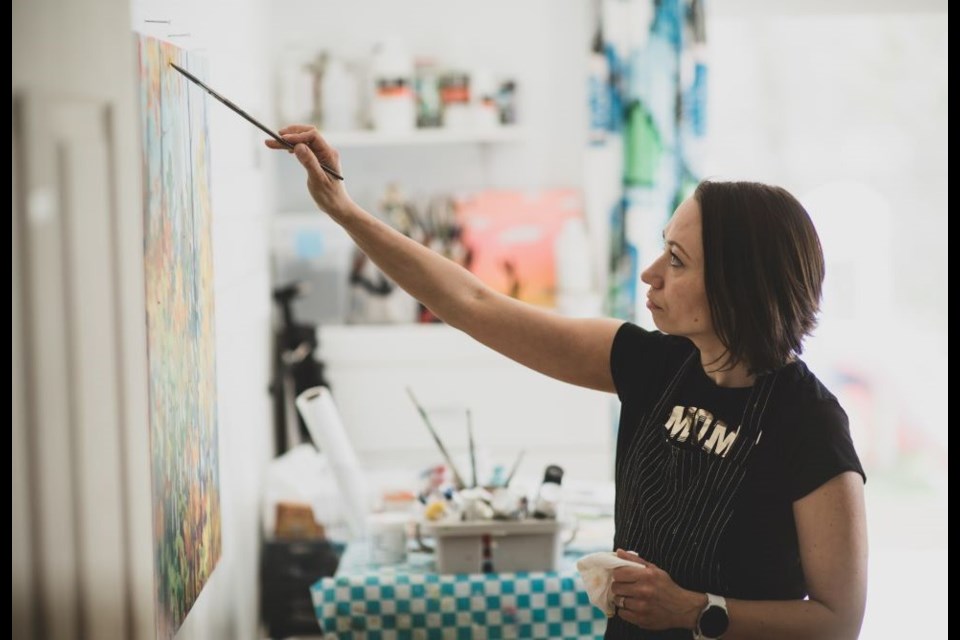 Vera Kisseleva paints in her home-based studio in Fergus. 