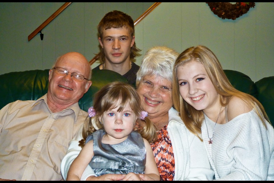 Laura Bieman, centre right, with her husband, Allan Bieman, left, and grand kids Levi, back, Ashlie, centre left, and Allana, right.