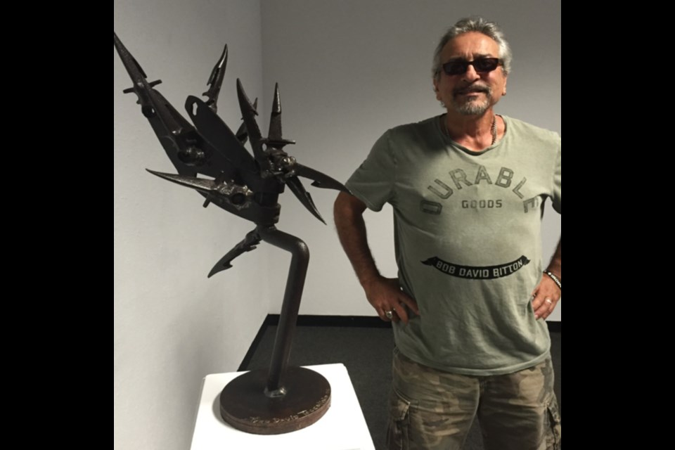 Tyzo Toccalino with one of his creations.