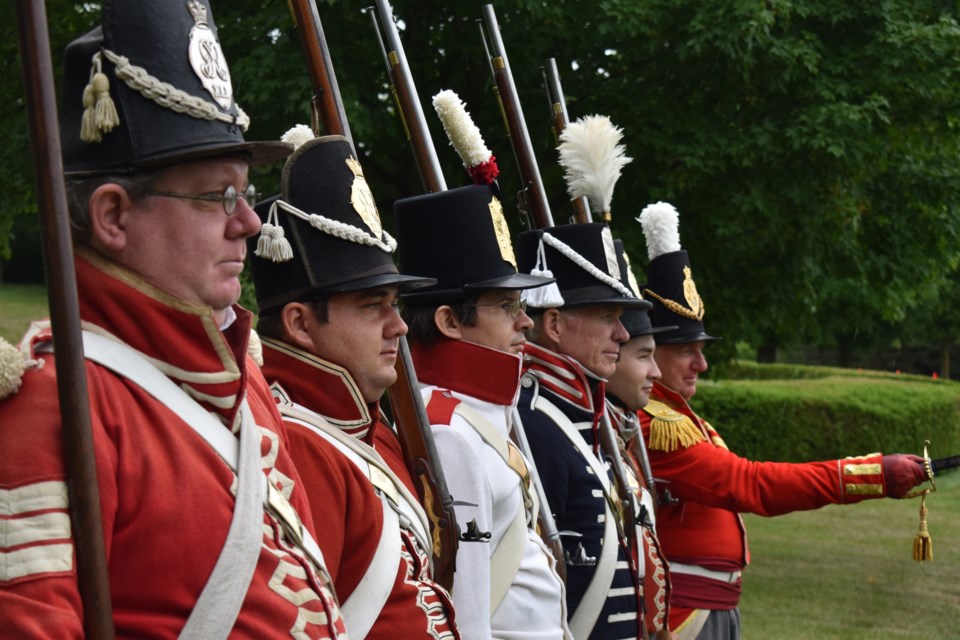 Canada at War Day features reenactments for an interactive lesson in Canada's role in major military conflicts. The 41st Regiment of Foot pictured are dedicated to the War of 1812.