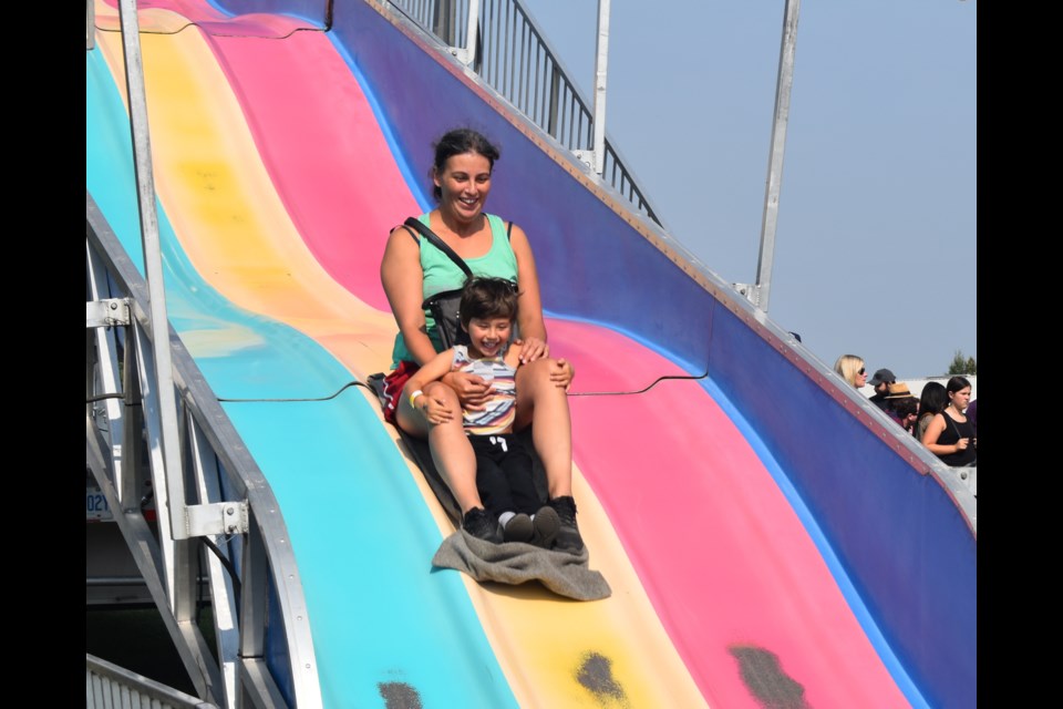 The slide proved to be a popular attraction for all ages. 