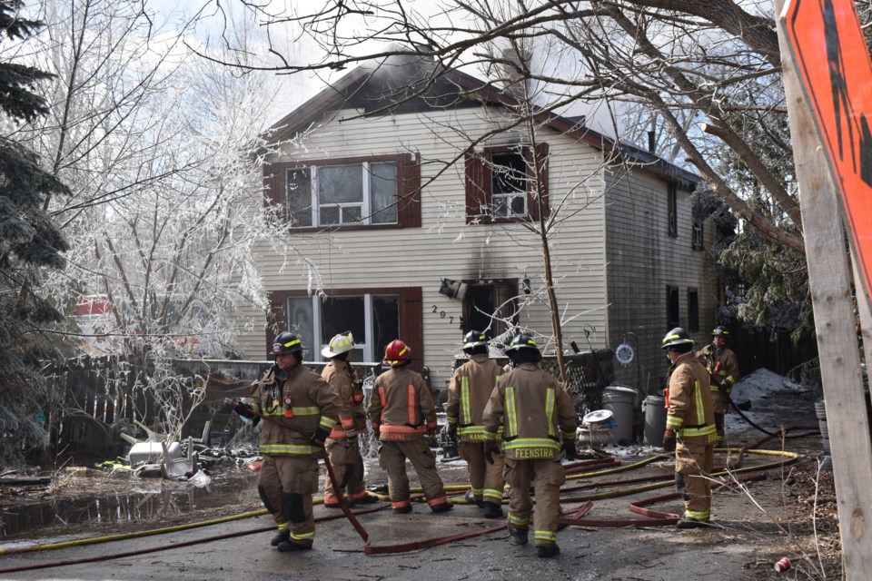 Smoke continued to billow out of the home many hours after fire crews first responded.