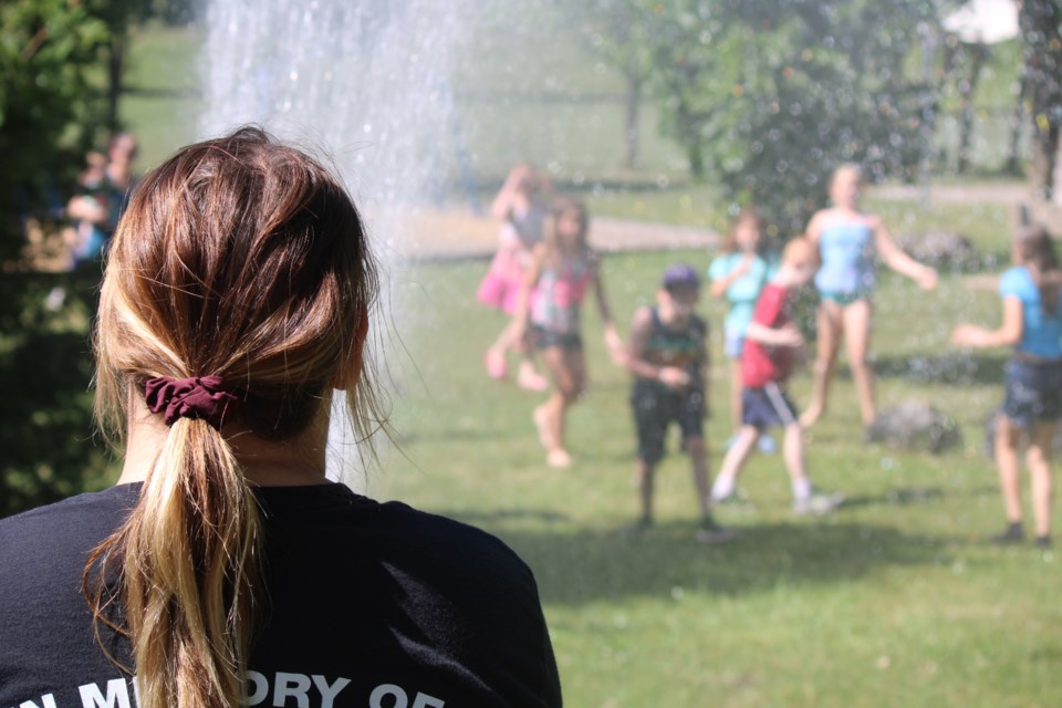 Local children in Eden Mills got to cool off courtesy of the Guelph/Eramosa fire department hose spray at a pop-up event in Memorial Park. 