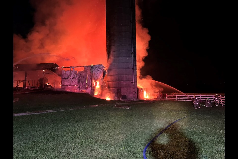 The barn fire took place Friday night on Wellington Road 17 near Alma and Woolwich Tonwship.