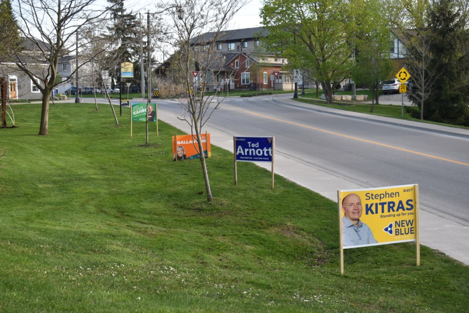 A few Wellington-Halton Hills provincial candidate signs in Elora. 