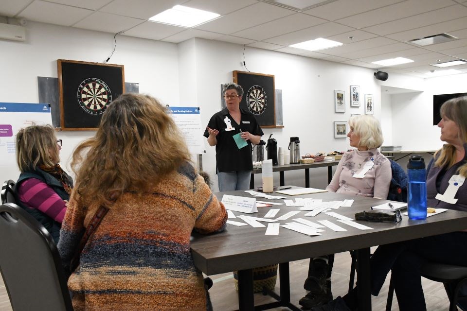 Beth Sanders, director of urban design and standards for the Municipality of Jasper, speaks to participants during a workshop at the Jasper Curling Lounge on Monday, April 7, 2025.