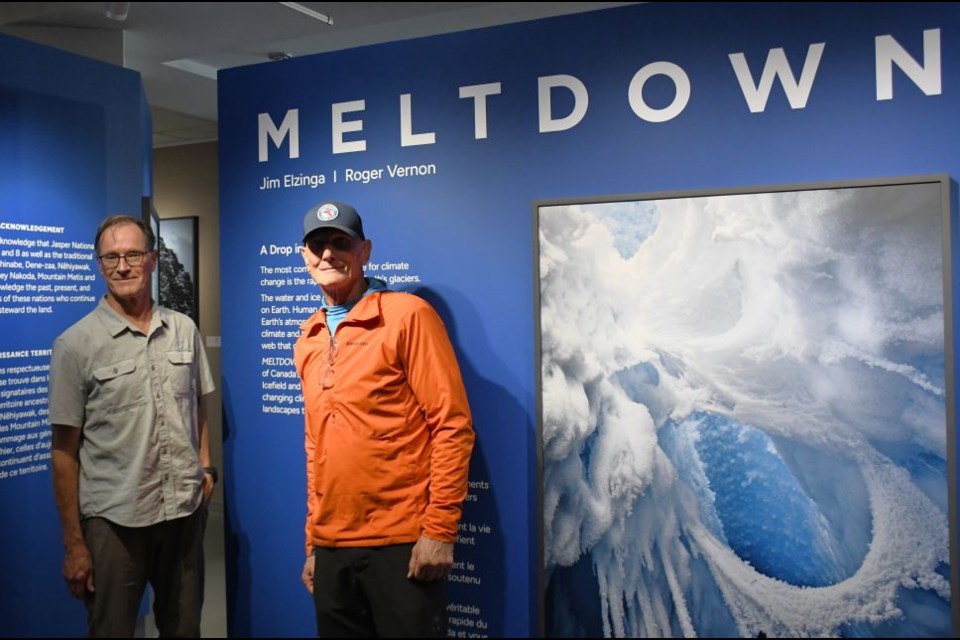 Roger Vernon (left) and Jim Elzinga gave a guided artists' talk during the official opening of "Meltdown: A Drop in Time" at the Glacier Gallery at the Columbia Icefield Discovery Centre on Thursday, Aug. 21, 2025.