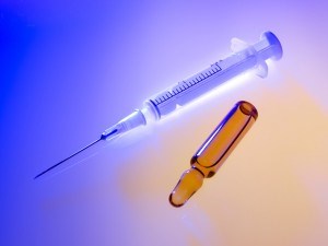 Ampule and syringe.