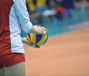 volleyball in hand