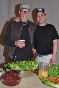Patrick Mooney, left, and Ivan Williams celebrate the final community dinner of the 10th year. File photo.