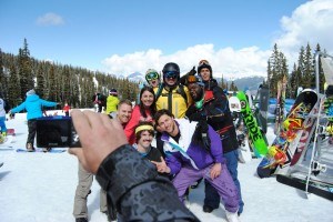 Const. Devon Slade poses for pictures with skiers and boarders at Marmot Basin_P. Clarke photo