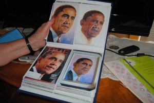 Agnus uses photos, such as the front cover of Time  Magazine to do her paintings. Here she holds up her paint of U.S. President Barack Obama. 