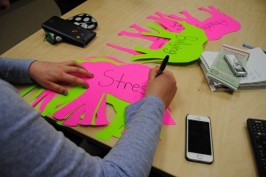 The neon coloured elephants were stuck to the school's walls from trunk to tail. 