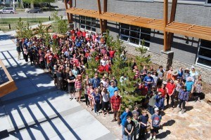 Students from Jasper Junior/Senior High School stand for a school photo, May 19, 2015. Photo – P. Clarke