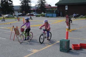 More than 50 children participated in Pedal Pushers, a program designed to teach them about bicycle safety, May 30. Photo - P. Clarke 