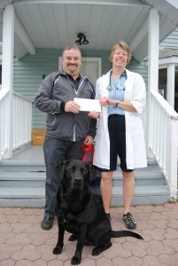 Fairmont Jasper Park Lodge donated $1,362 to the Jasper Veterinary Clinic to help abused and abandoned animals. Photo - P. Clarke.