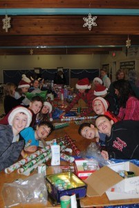 Santas Anonymous, wrapping presents_P.Clarke.02