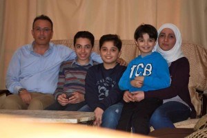 Omar was reunited with wife, Rola, and their children in Egypt after being separated for 241 days due to visa issues. Photo provided.