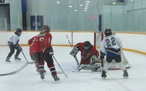 Kelan Polard stops a Mustangs' shot in Wabasca on Sunday. Photo submitted.