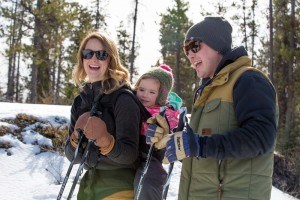 a family go cross country skiing with their toddler at wabasso campground in the winter