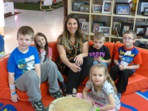 Kindergarten teacher Lee Ann Cross sits among some of her students at St. George Catholic School, which was nationally recognized for its kindergarten program. Photo submitted.