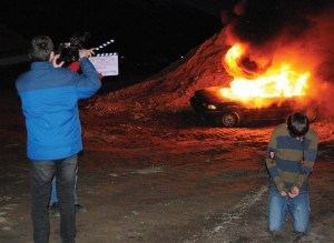 Nathan Clark's Grade 9 language arts class got an opportunity to burn a car as part of a film the class is working on. P. Clarke photo.
