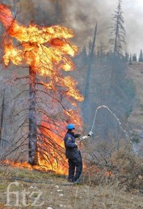 Fire Chief Greg Van Tighem spoke at a town information meeting, May 18, about various hazards including wildfires. File photo.