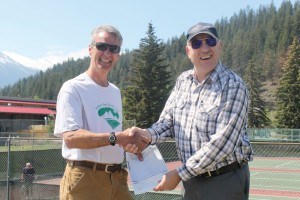 West Yellowhead MLA Eric Rosendahl (right) shakes Adam Parks hand from the Jasper Park Tennis Club. Photo - K. Byrne.