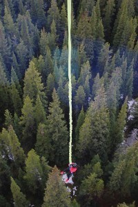 Teams had to travel underneath the Jasper Sky Tram some 250 feet above the earth with only a bungee cord attached for protection in order to get the next clue. The majority of the teams failed to complete the challenge. P. Clarke photo. 