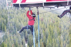 To get the next clue racers had to try to travel across the bottom of the Sky Tram like monkey bars. P. Clarke photo. 
