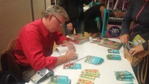 Gardening guru Mark Cullen signed copies of his latest book after his talk on May 31. Photo - K. Byrne 