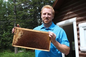 Cory LeDrew, the general manager for the Overlander Lodge, spearheaded the initiative to bring 36,000 honeybees to the hotel. P. Clarke photo. 
