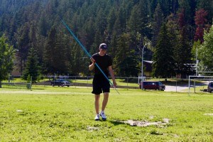 Nik Kellis practices throwing a javelin at Centential Field. He recently won first place in the U-17 category at the Alberta Summer Games. Submitted photo